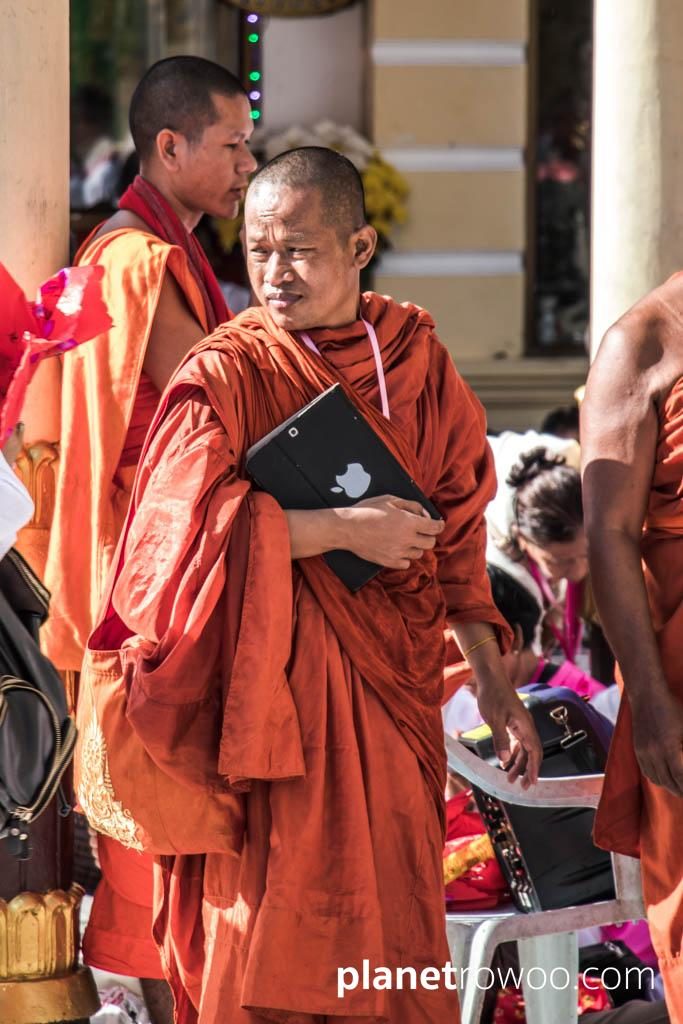 Pilgrim monk with iPad