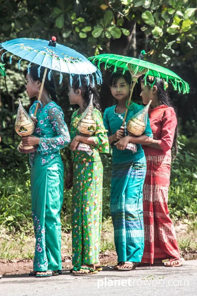 Burmese girls in traditional dress at a Shinbyu ceremony
