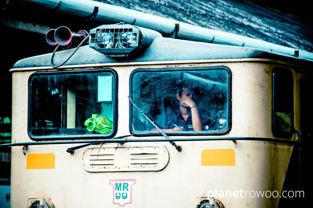 Locomotive driver through window, Yangon Central station