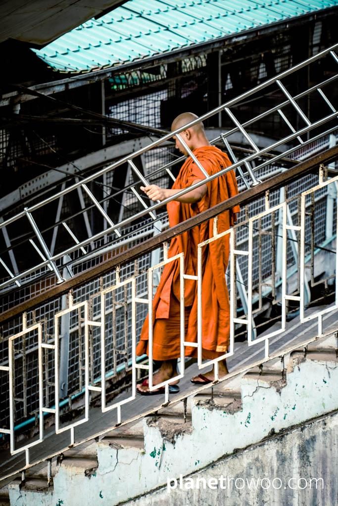 Monk entering Yangon Central station