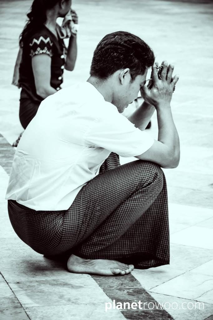 Paying respects at the Sule Pagoda, Yangon