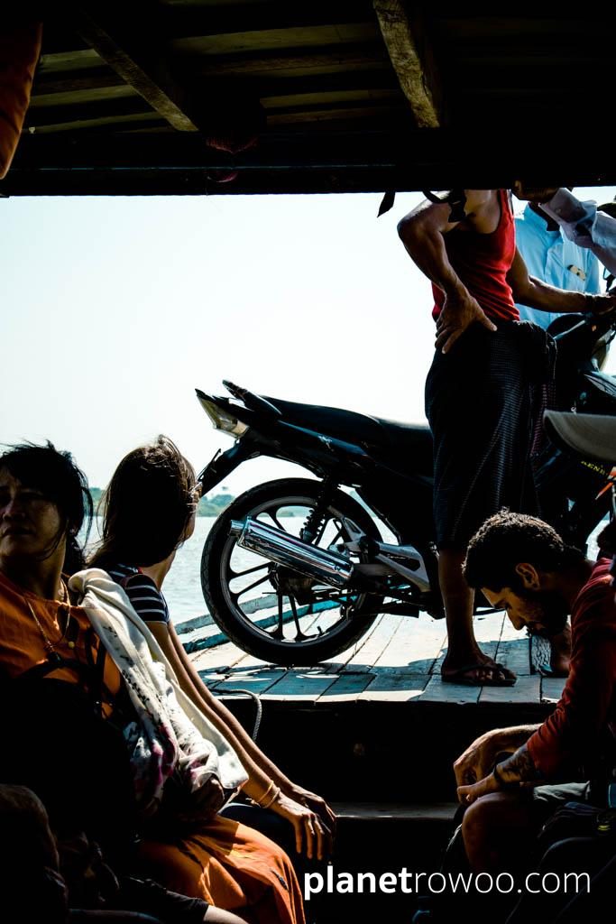 Passengers and motorbike on the Inwa ferry boat