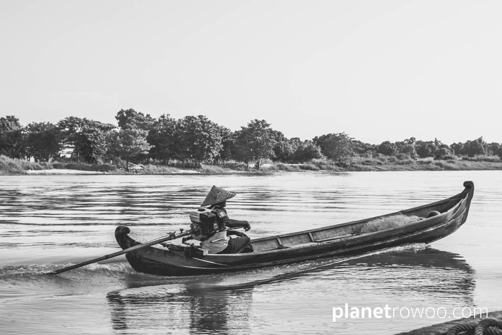 Fisherman in his motorboat on the Myitnge river