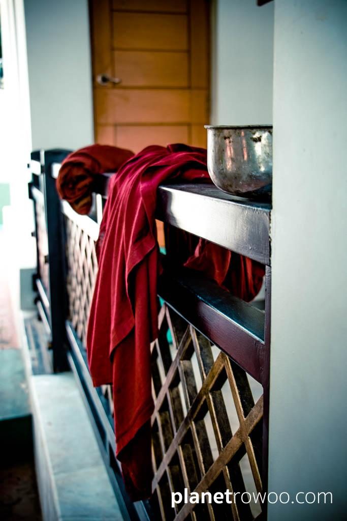 Monks robes draped over a balustrade