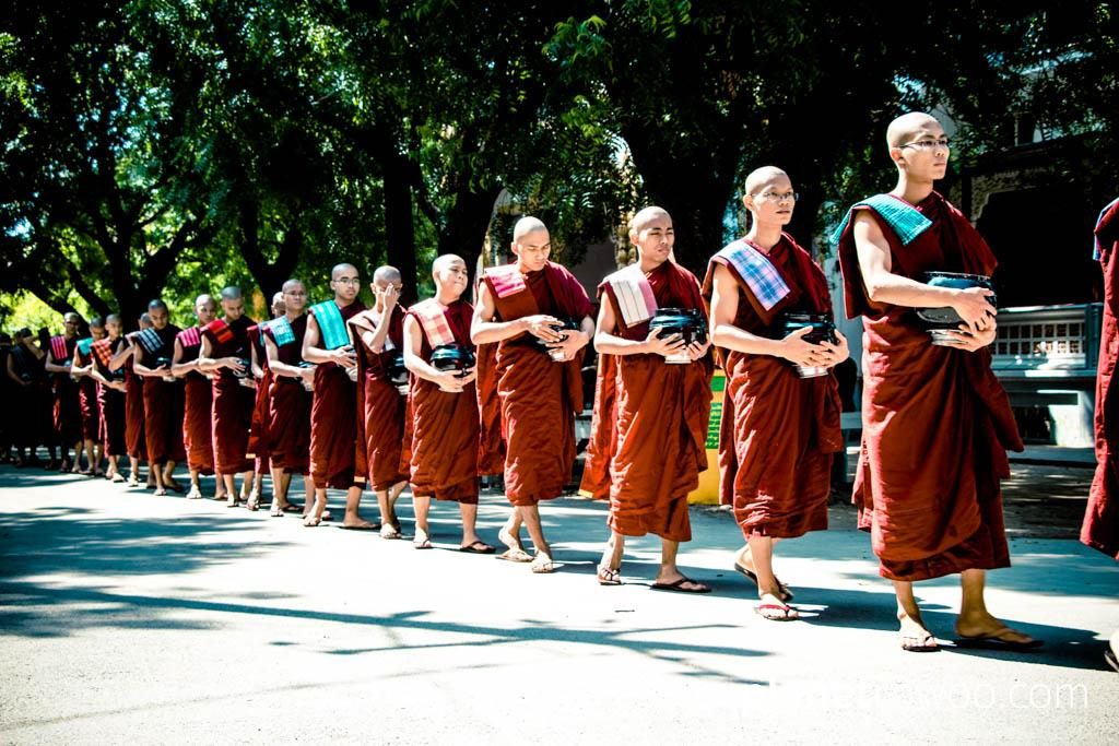 Monks wait in line for lunch at Mandalay monastery