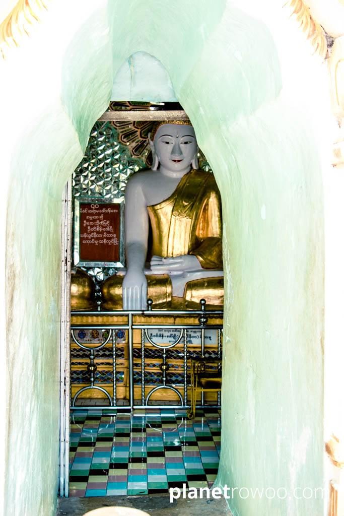 Buddha through archway, U Min Thonze Pagoda