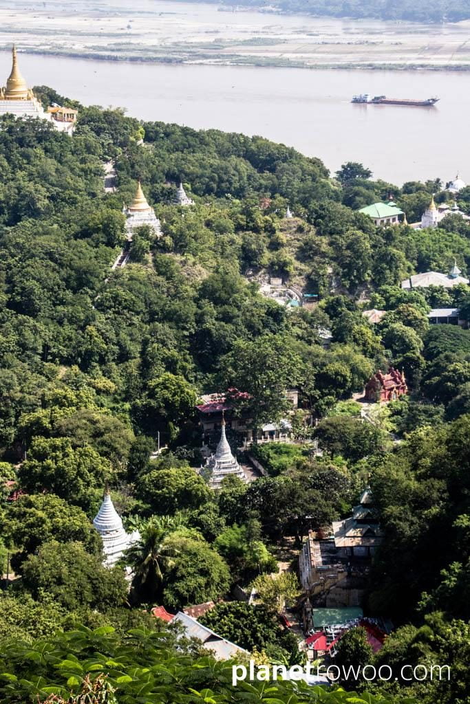 View across the pagoda-decorated hills of Sagaing, with the Irrawaddy beyond