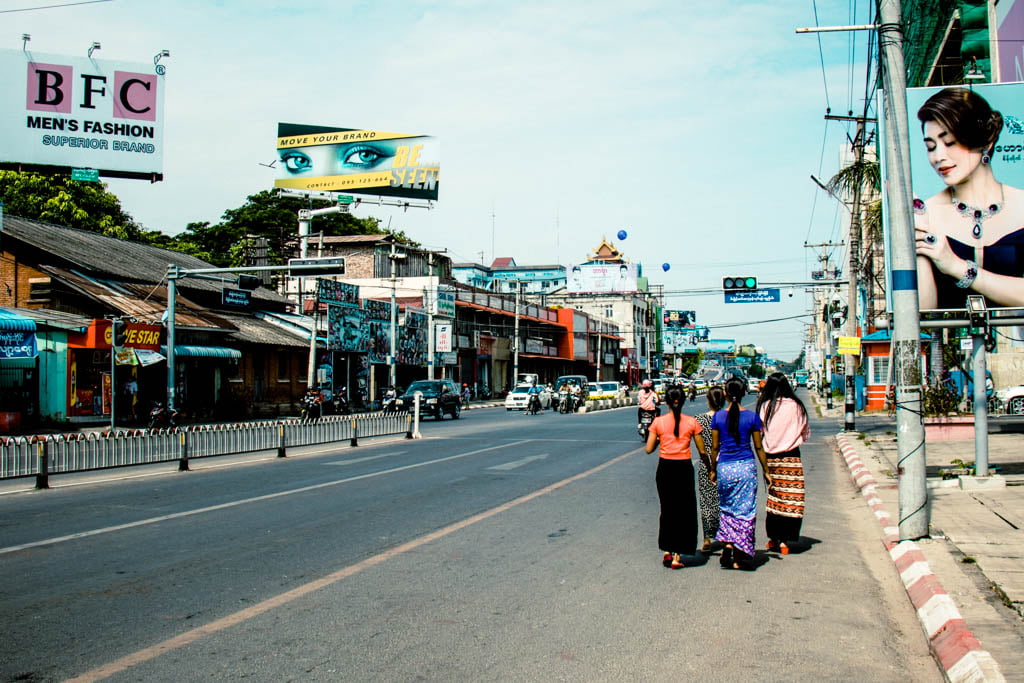 Local women walking north on 78th Street, Mandalay