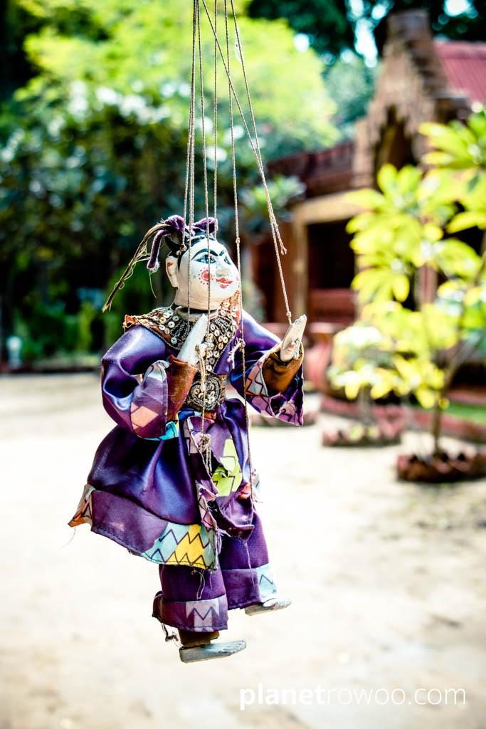 Traditional Burmese puppet hanging outside a restaurant in New Bagan