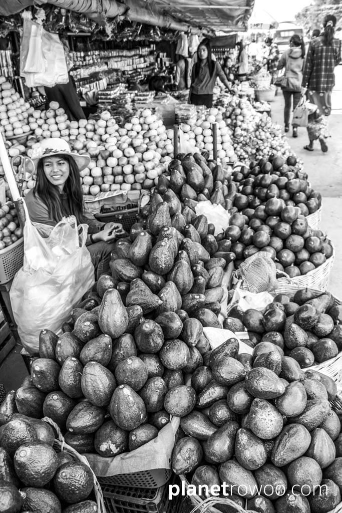 Kalaw market trader amongst her produce