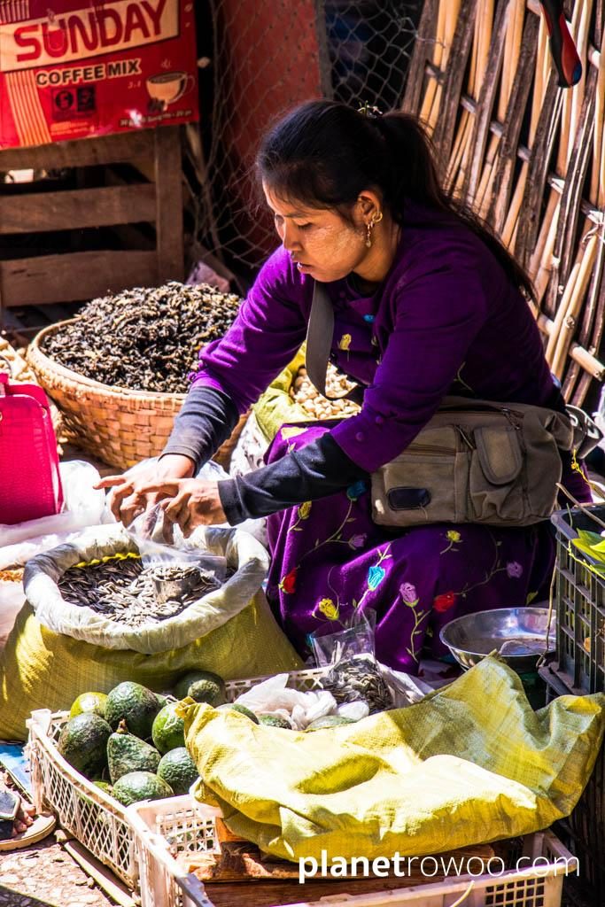 Kalaw market trader packages beans for sale