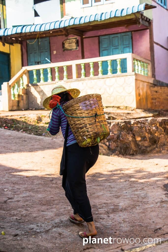 Woman carrying basket in Pein Ne Bin village, Kalaw
