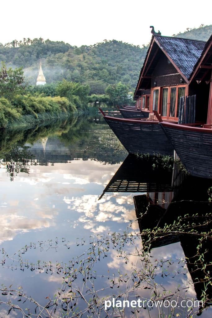 View down the waterway towards a local temple, Pristine Lotus Resort