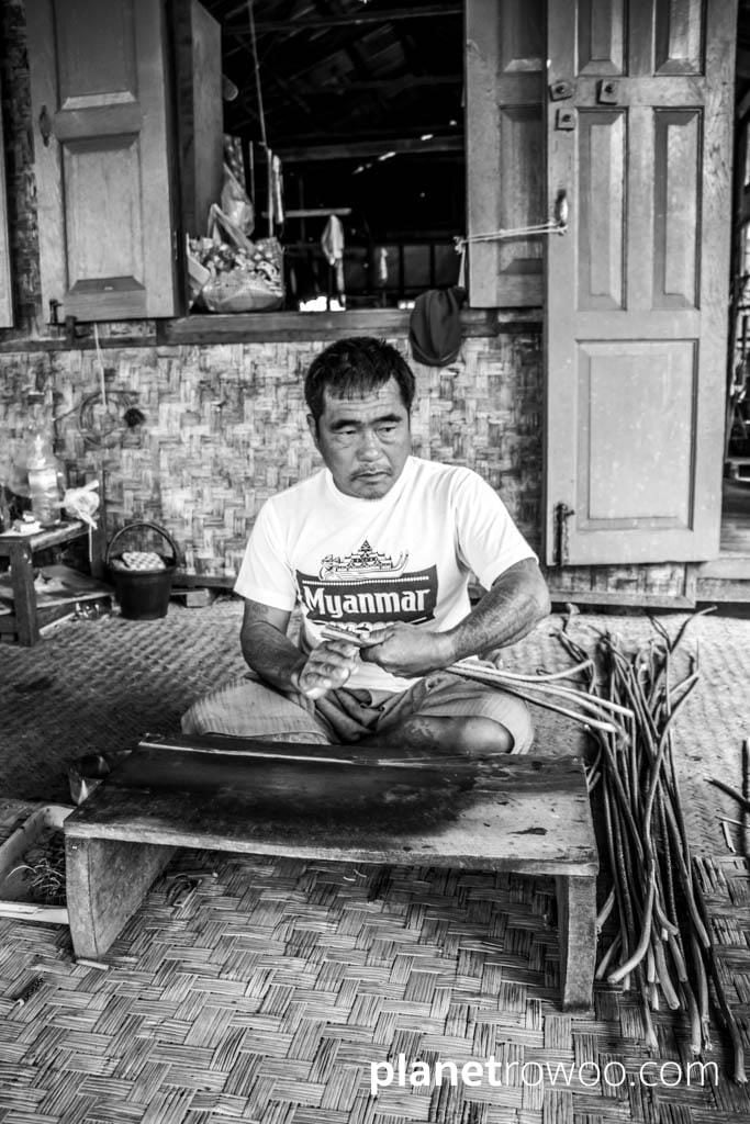 Extracting threads from the lotus plant, Inpawkhone weaving village