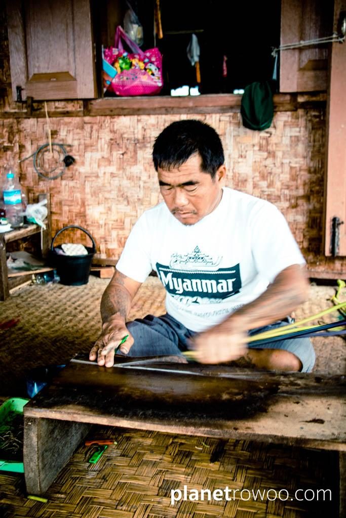 Extracting threads from the lotus plant, Inpawkhone weaving village