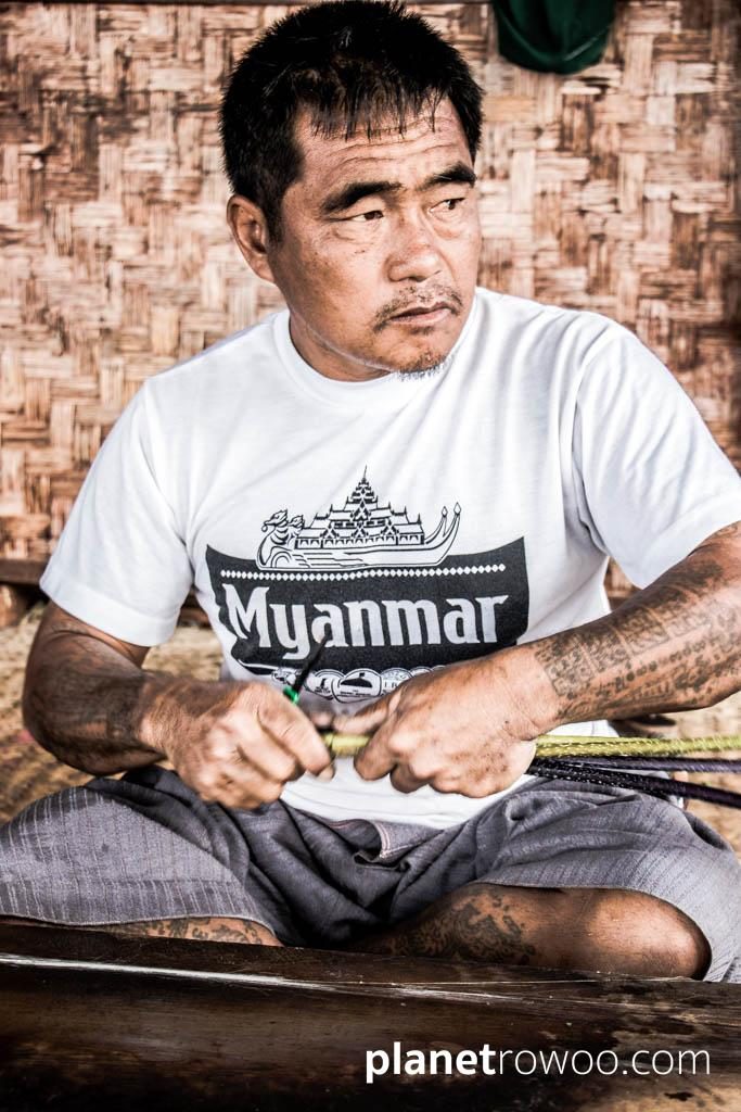 Extracting threads from the lotus plant, Inpawkhone weaving village