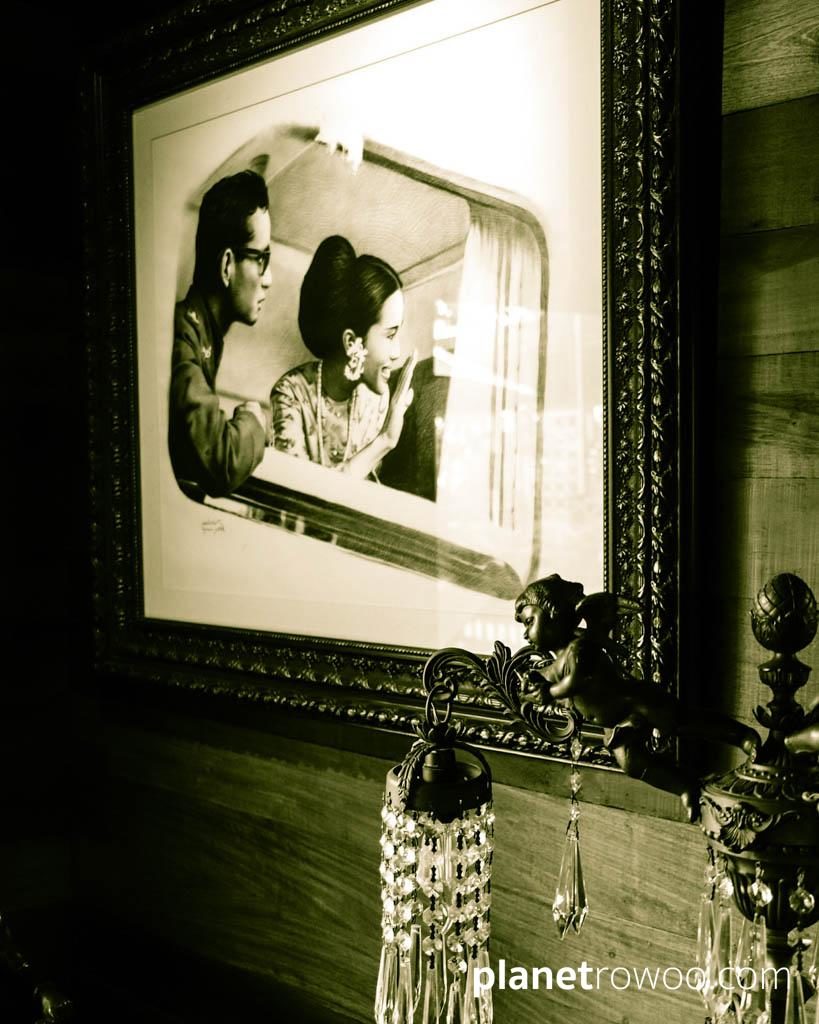 Drawing by Larp Ampairat of His Majesty the King Rama IX and Her Majesty the Queen travelling by train after their royal marriage