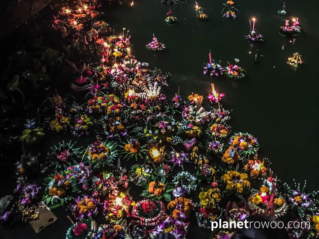 A colourful mass of Loy Krathong offerings on the Ping River