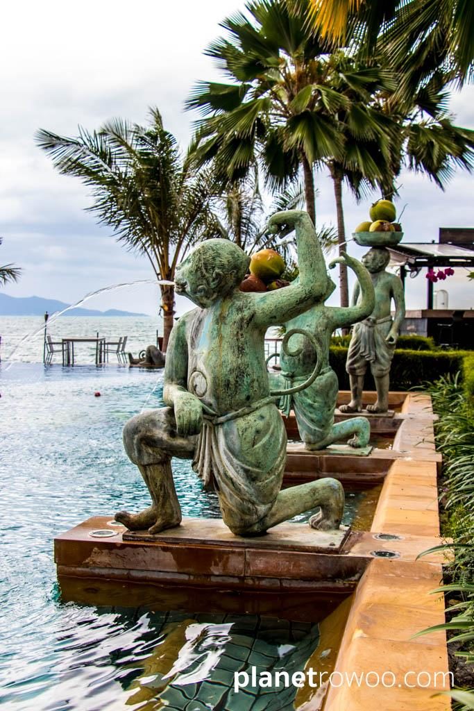 Monkey statues line the infinity pool at Anantara Bophut