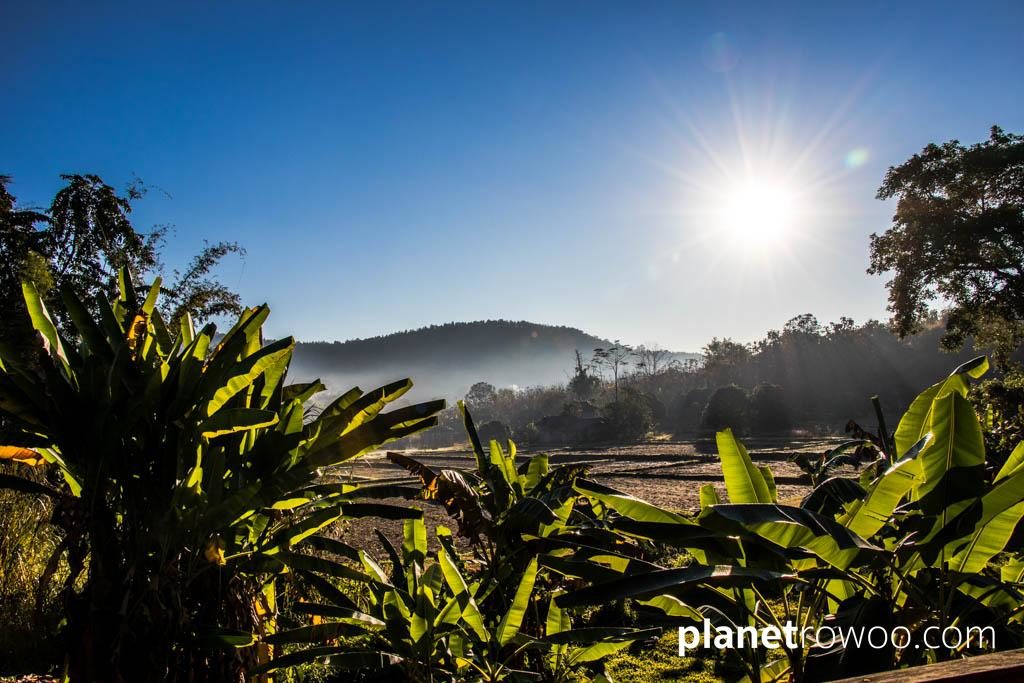 View across the valley at dawn from Lisu Lodge