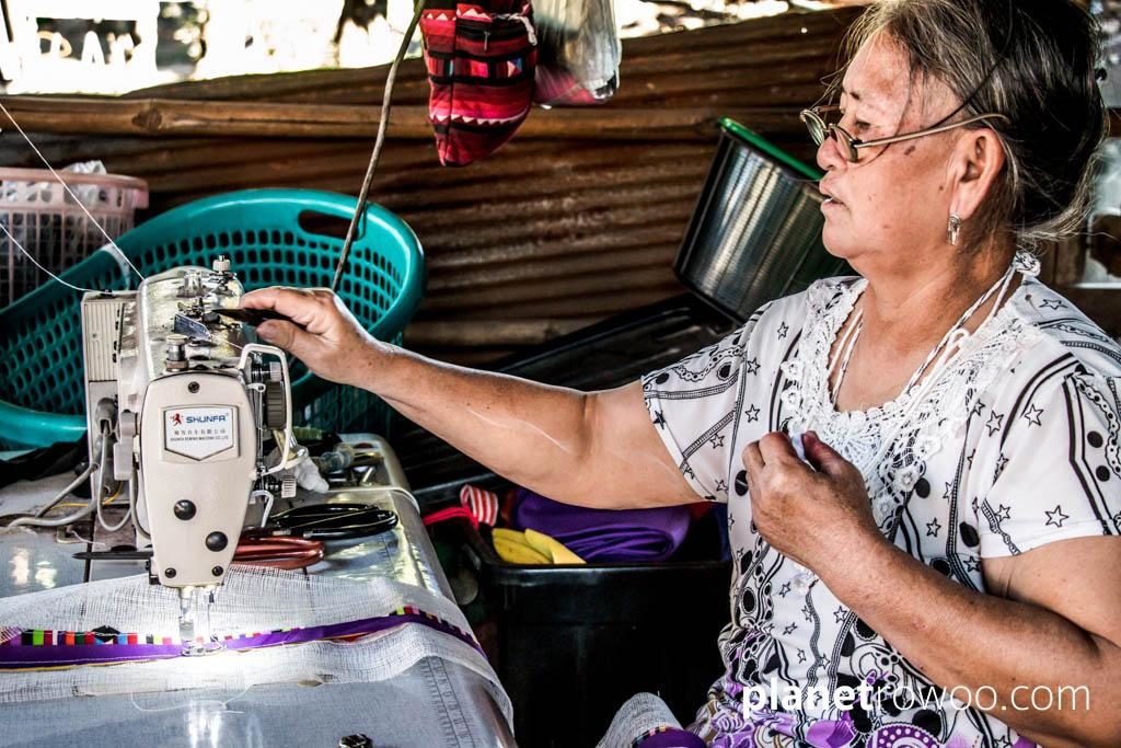 Lisu hill tribe seamstress making traditional wares