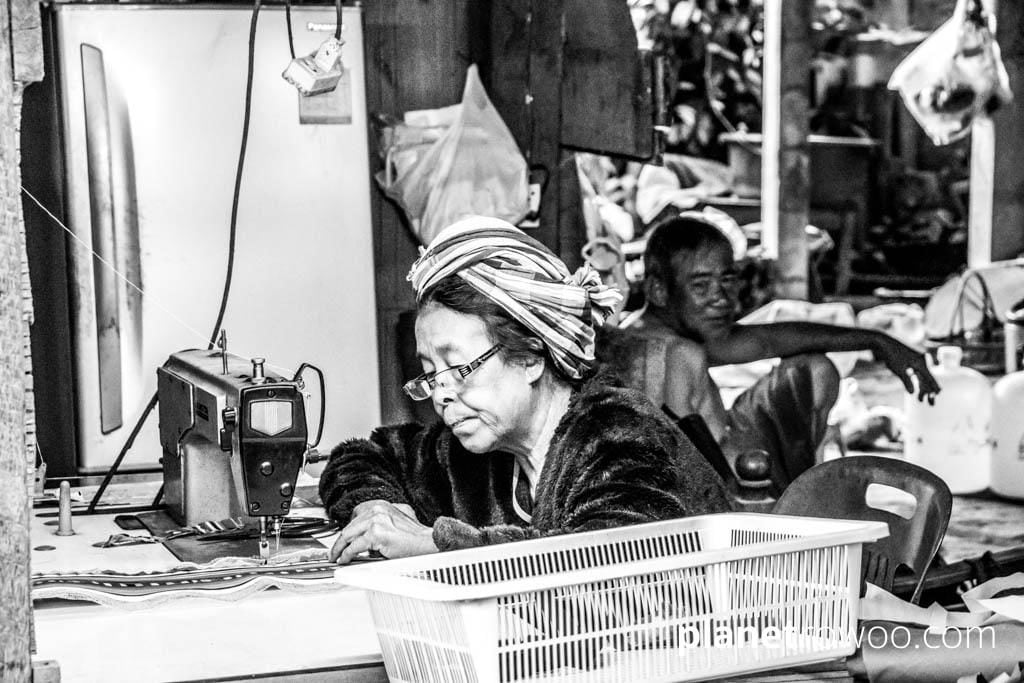 Lisu hill tribe seamstress making traditional wares