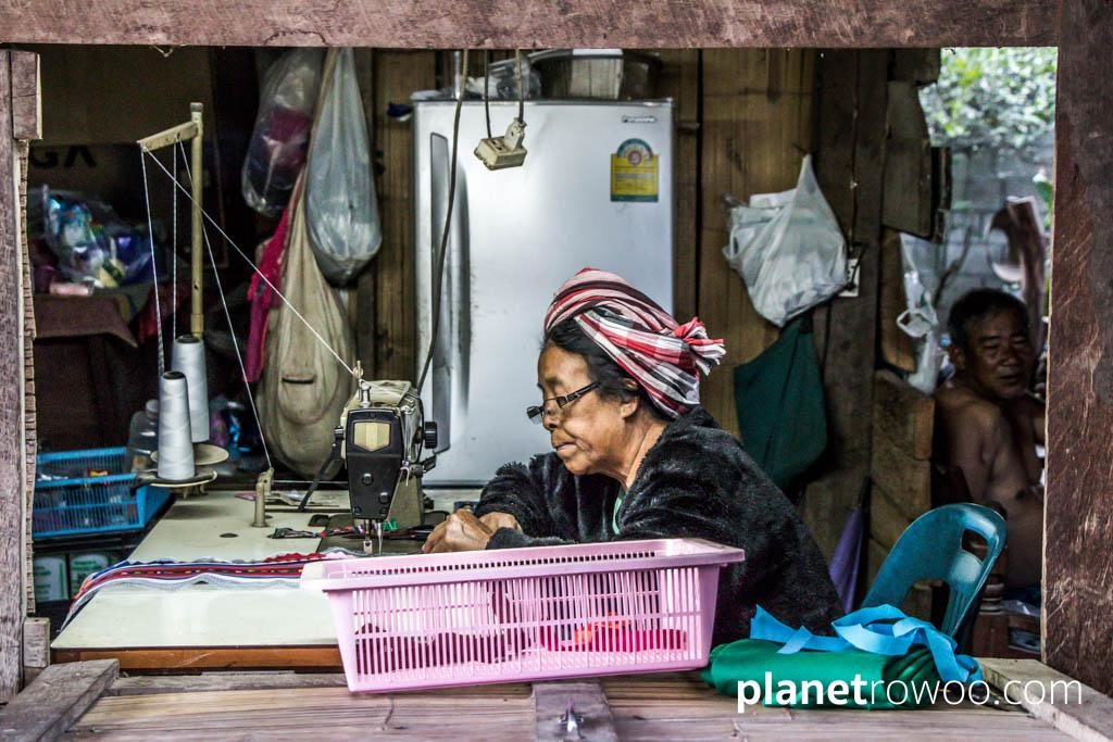 Lisu hill tribe seamstress making traditional wares