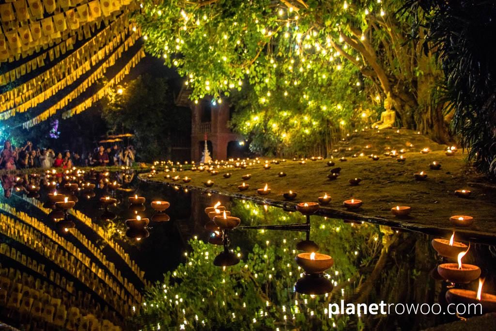 Crowds gather for Makha Bucha to pay respect to the Buddha image at Wat Phan Tao, Chiang Mai