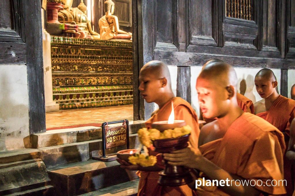 Monks perform the wian tian candlelight procession at Wat Phan Tao, Chiang Mai