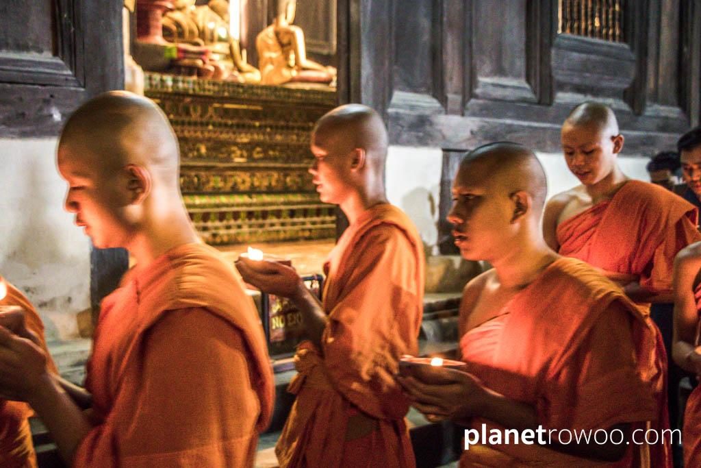 Monks perform the wian tian candlelight procession at Wat Phan Tao, Chiang Mai