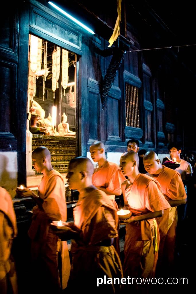 Monks perform the wian tian candlelight procession at Wat Phan Tao, Chiang Mai