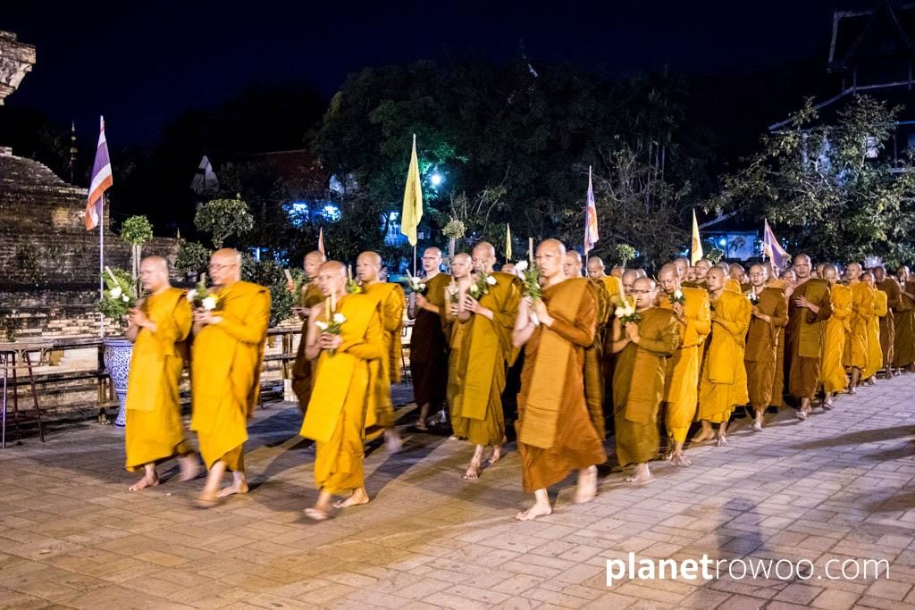 Monks perform the wian tian candlelight procession at Wat Chedi Luang, Chiang Mai