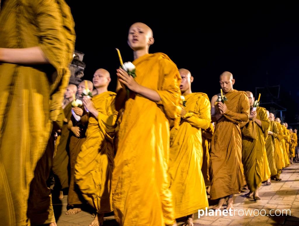 Monks perform the wian tian candlelight procession at Wat Chedi Luang, Chiang Mai
