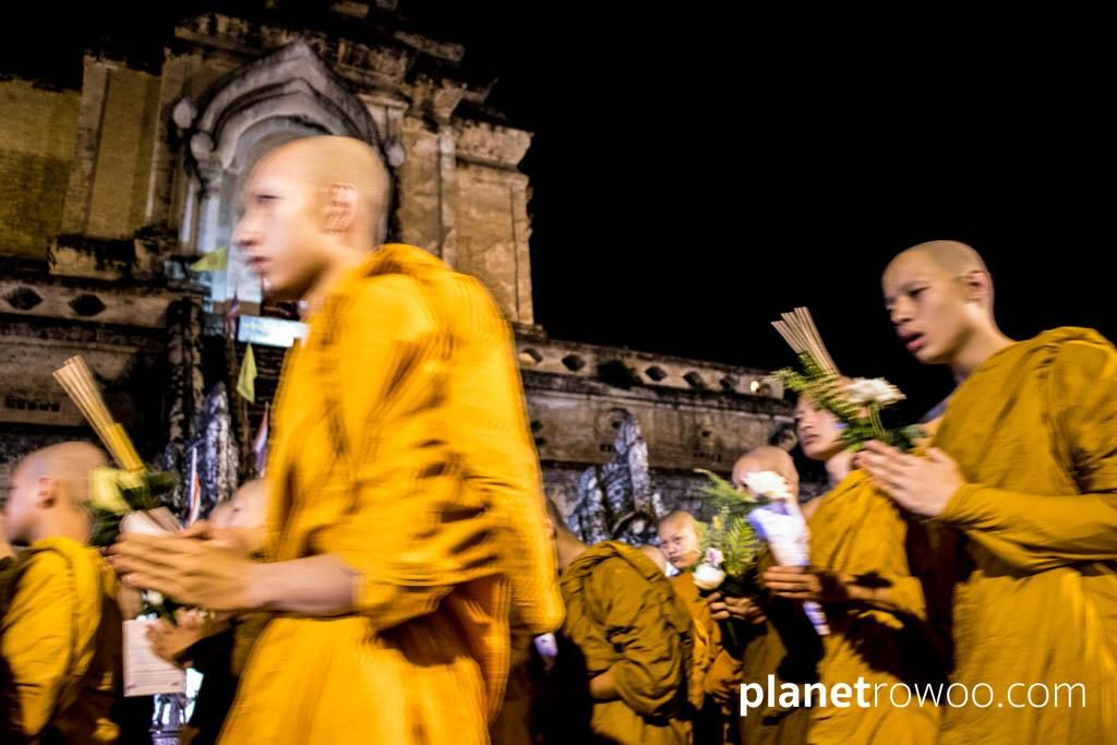 Monks perform the wian tian candlelight procession at Wat Chedi Luang, Chiang Mai