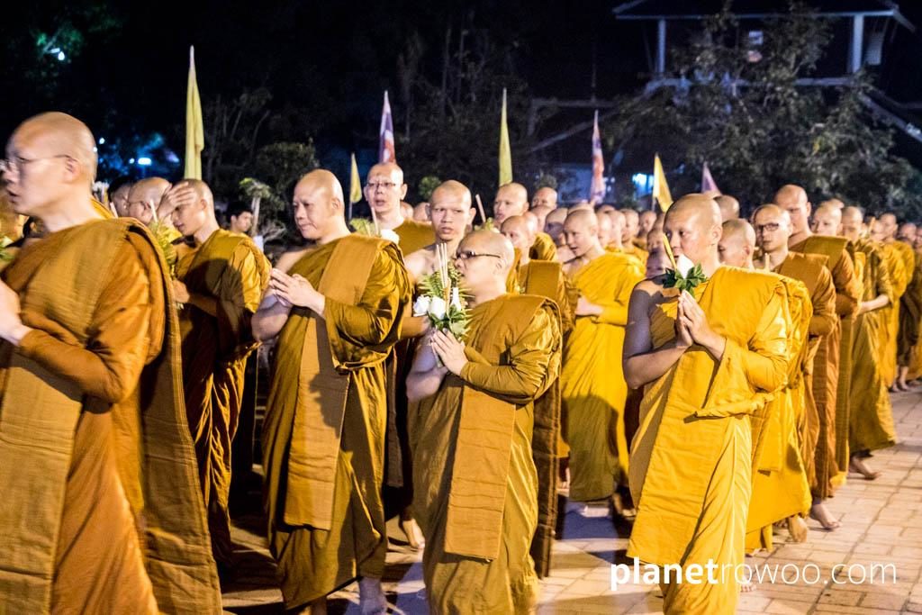 Monks perform the wian tian candlelight procession at Wat Chedi Luang, Chiang Mai