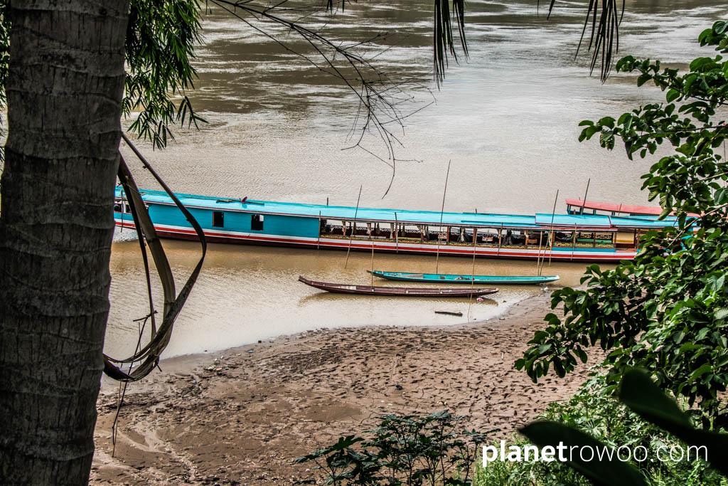 Laos traditional long boats on the Mekong River at Luang Prabang