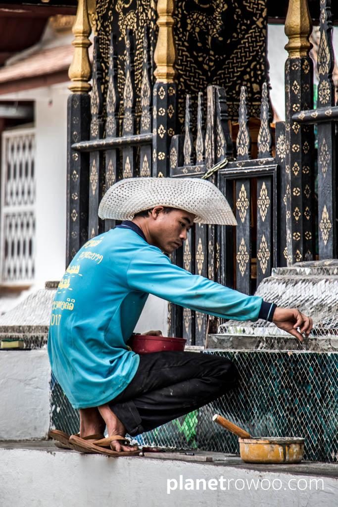 Restoration work on the Wat Xieng Thong sim, Luang Prabang, Laos