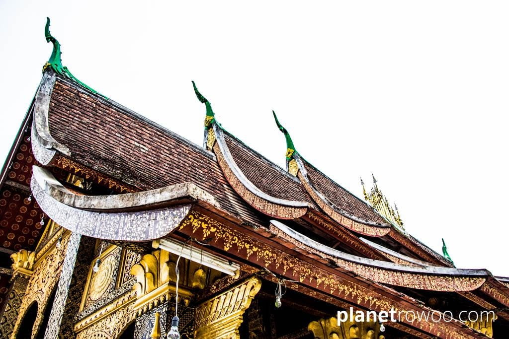 The multi-tiered roof of Wat Xieng Thong sim, Luang Prabang, Laos