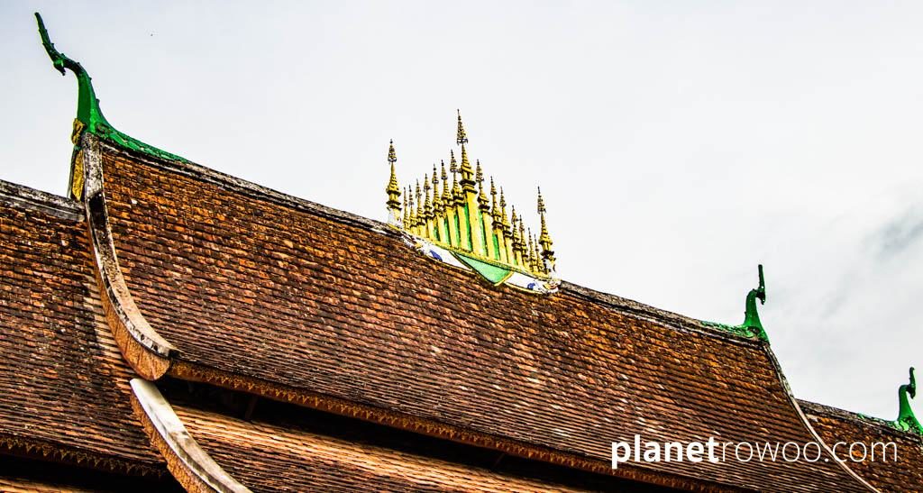 The gilded ornamental roof element, or “Dok so faa”, on Wat Xieng Thong, Luang Prabang, Laos